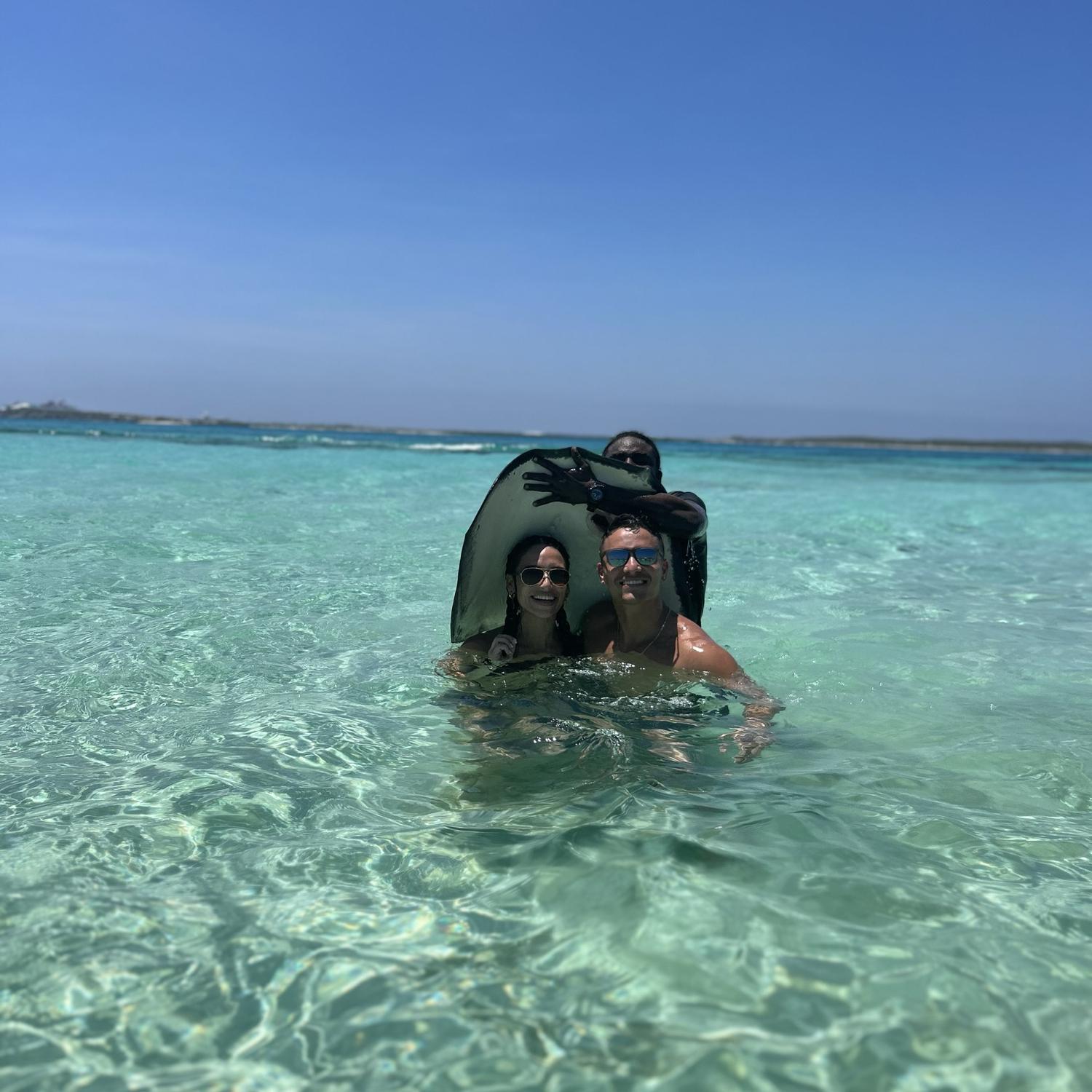 We love to travel and try new things ! Here we went swimming with stingrays in Turks and Caicos !
