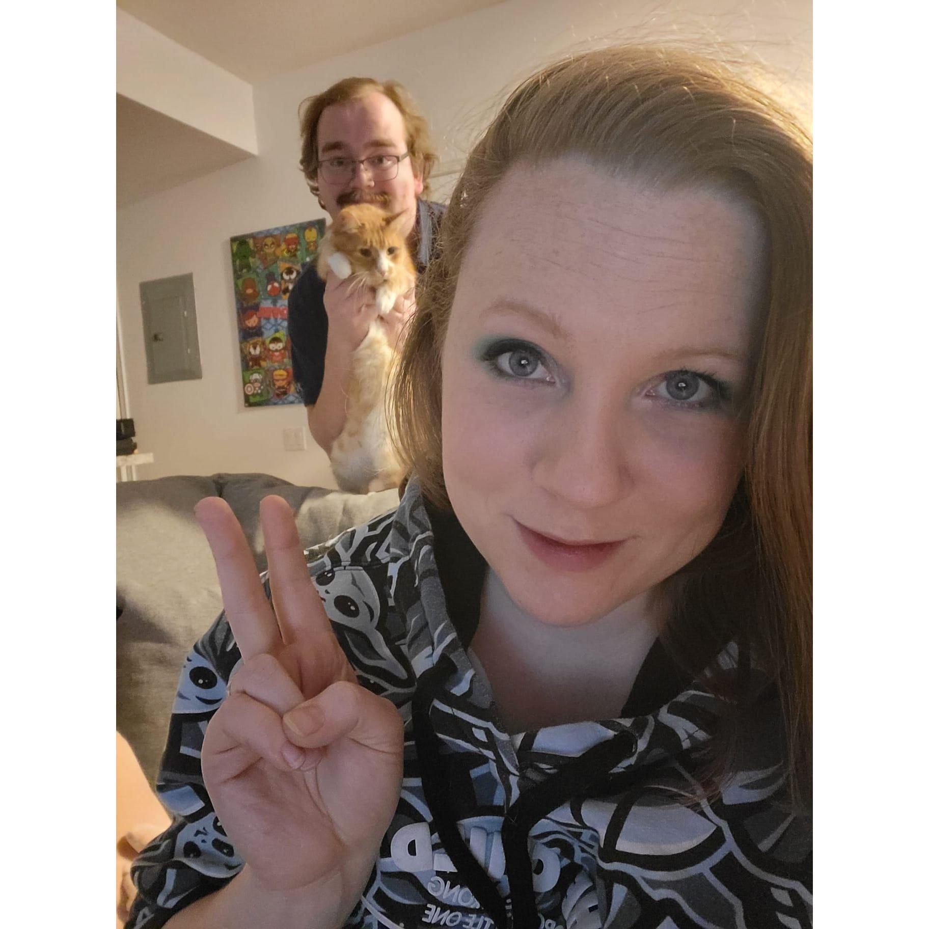 Hard to tell who's photobombing when the cat is clearly the star!