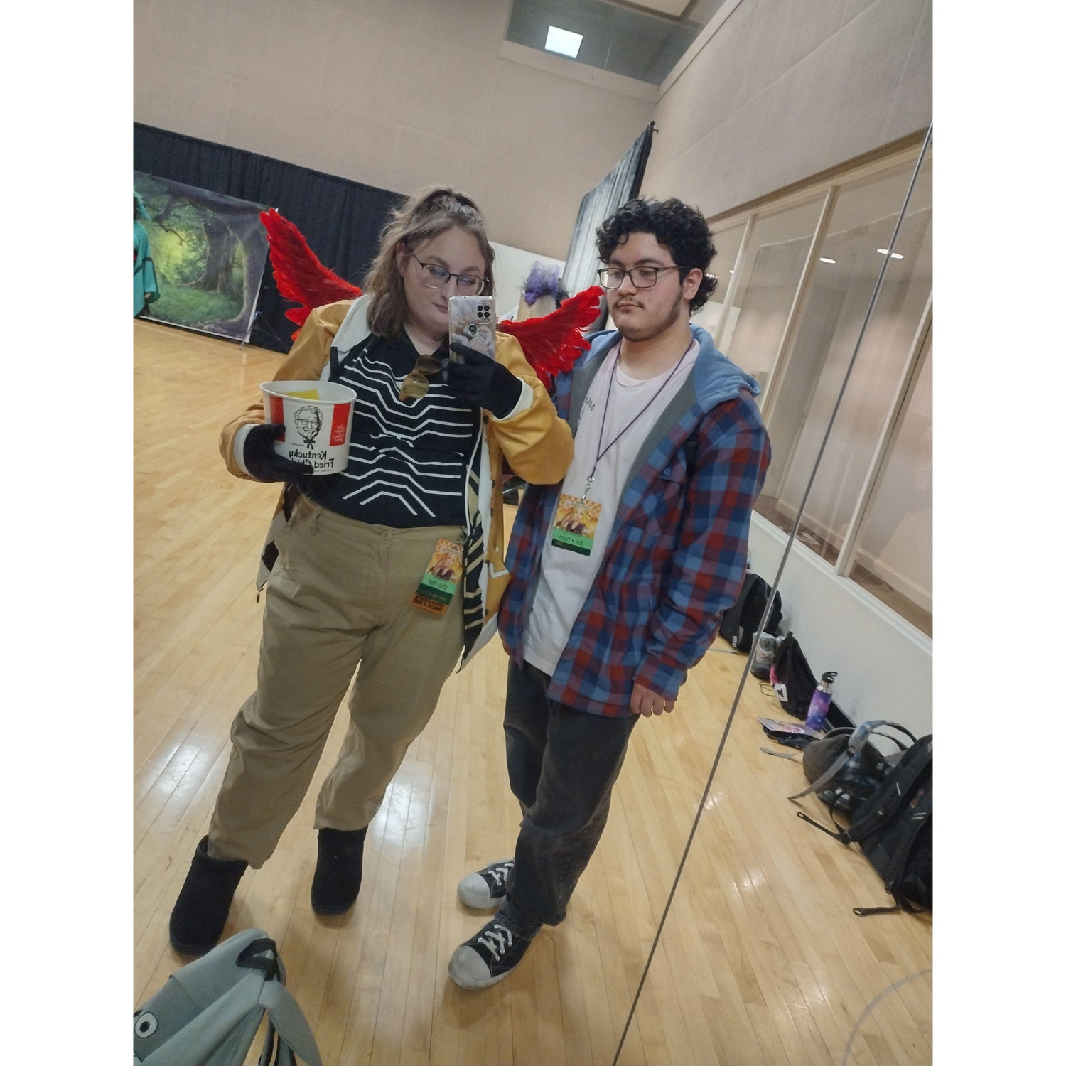 Our first cosplay con as a couple, she was dressed as Hawks from My hero academia