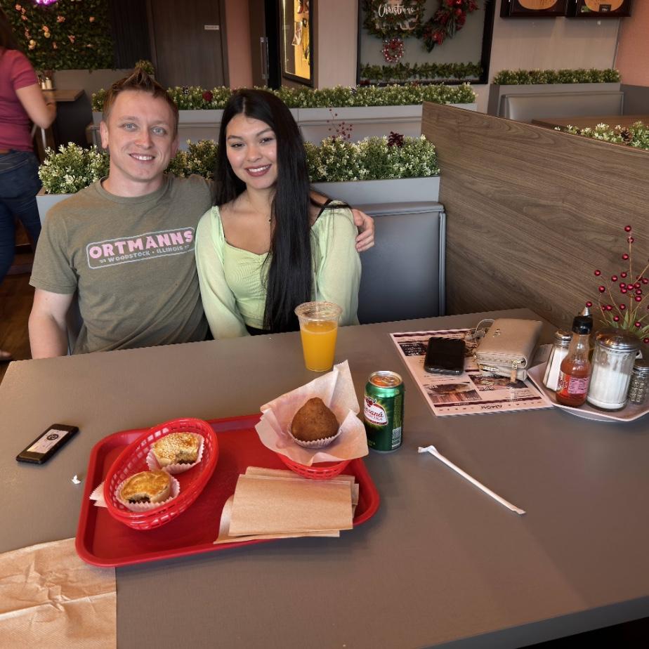 Emmet and Isa in Orlando at a Brazilian bakery - December 2023