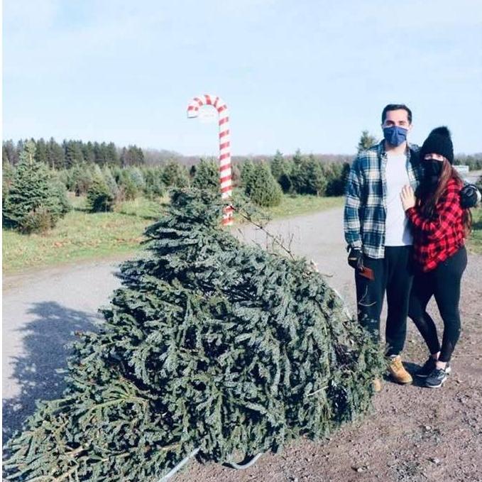 Cutting down our first Christmas Tree