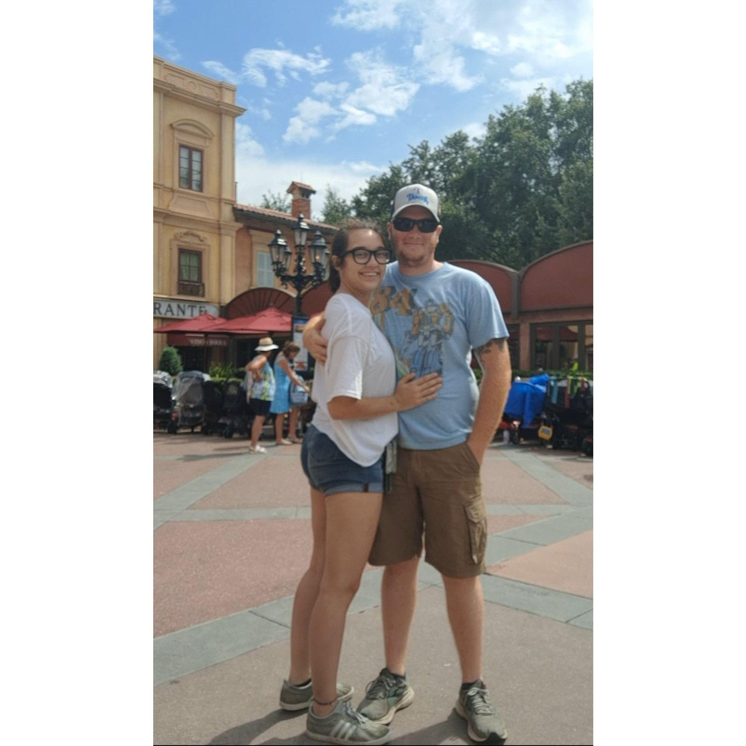 Standing in Italy at EPCOT, hoping to one day to take a picture together in real Italy.