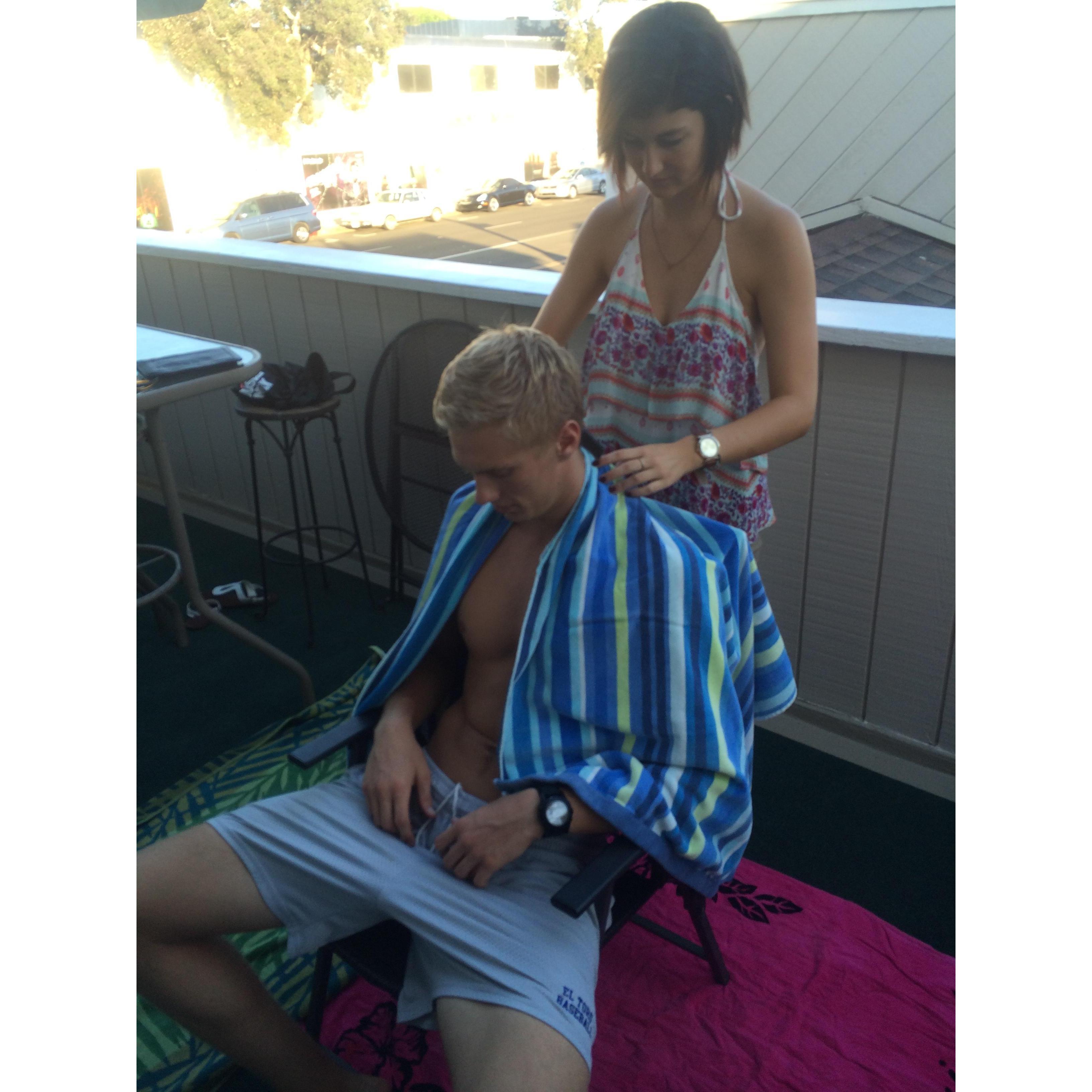 Getting another haircut on the balcony in Newport Beach