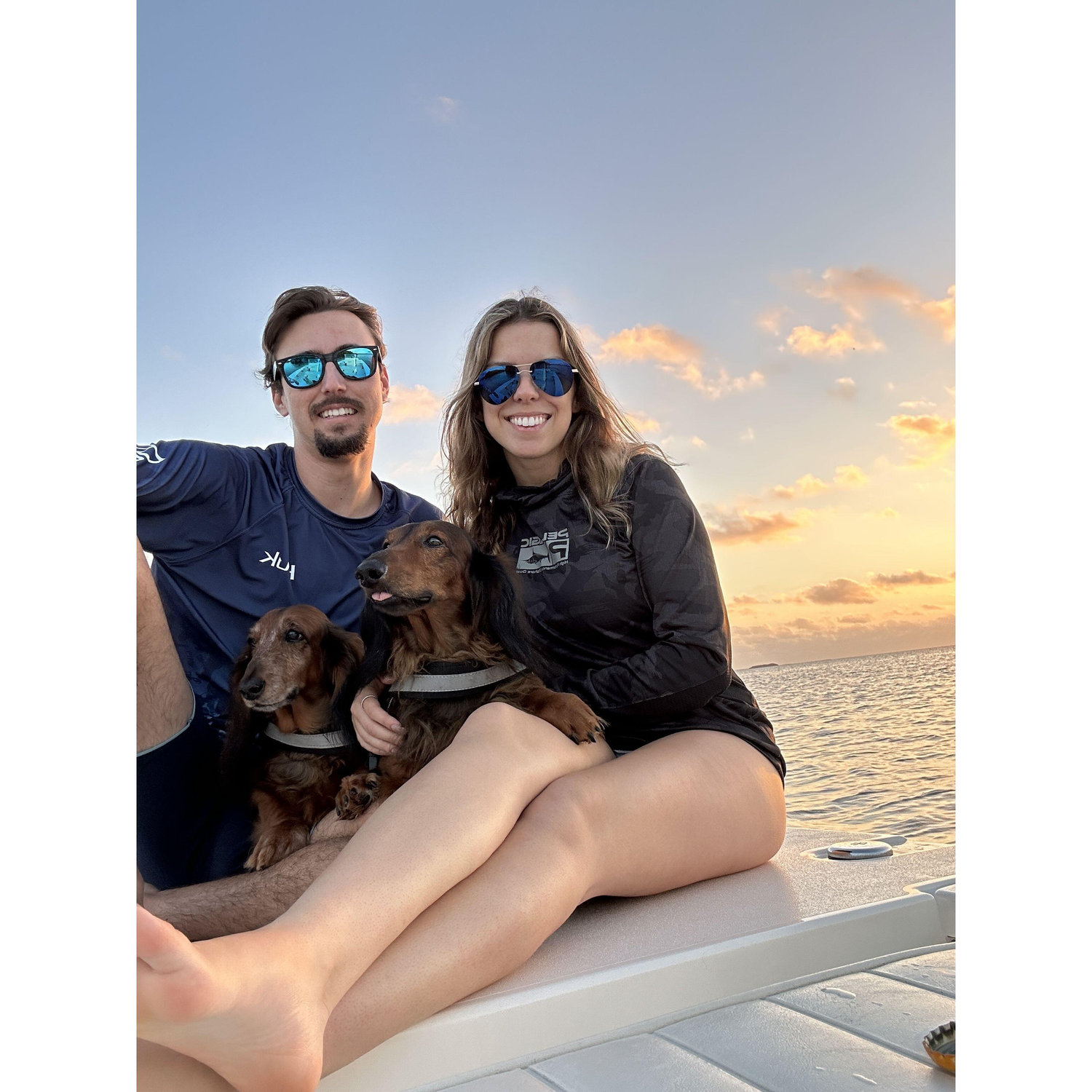 February 2023: Sunset boat ride with the pups!