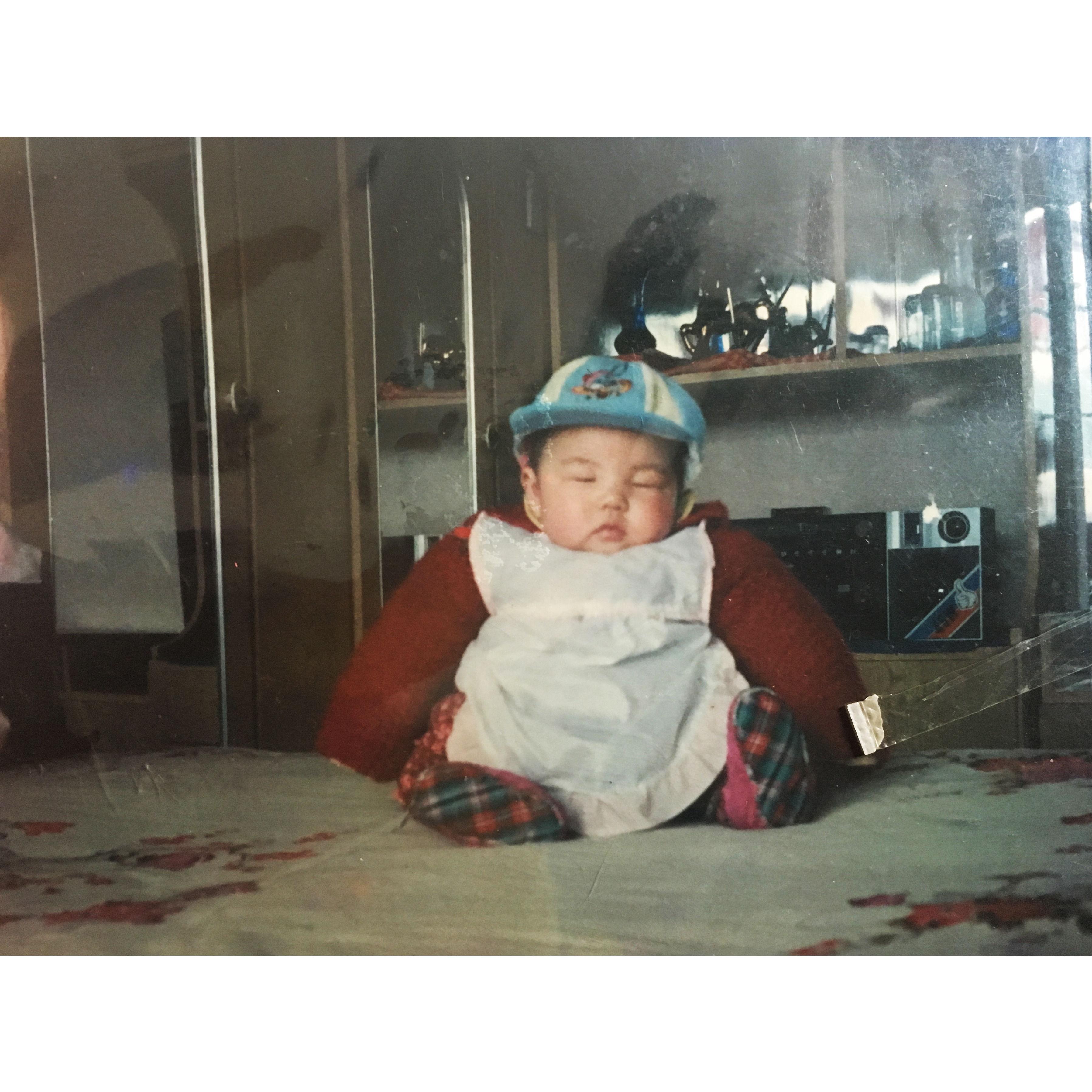 Guess who is this drowsy cutie pie? Hint: blue hat