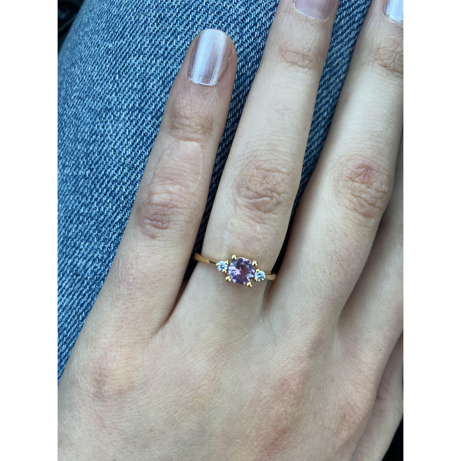 Josiah picked a beautiful pink sapphire with two side diamonds
