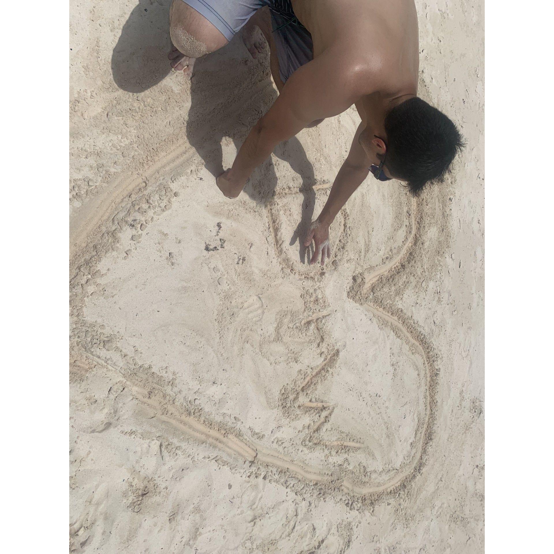 The first of many D+W hearts in the sand.