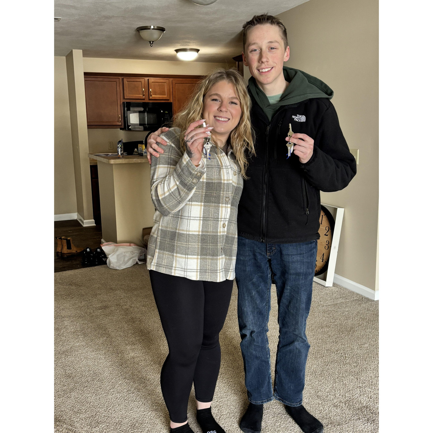 Us right after getting the keys to our first apartment together!