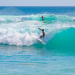 Surfing at Dreamland Beach