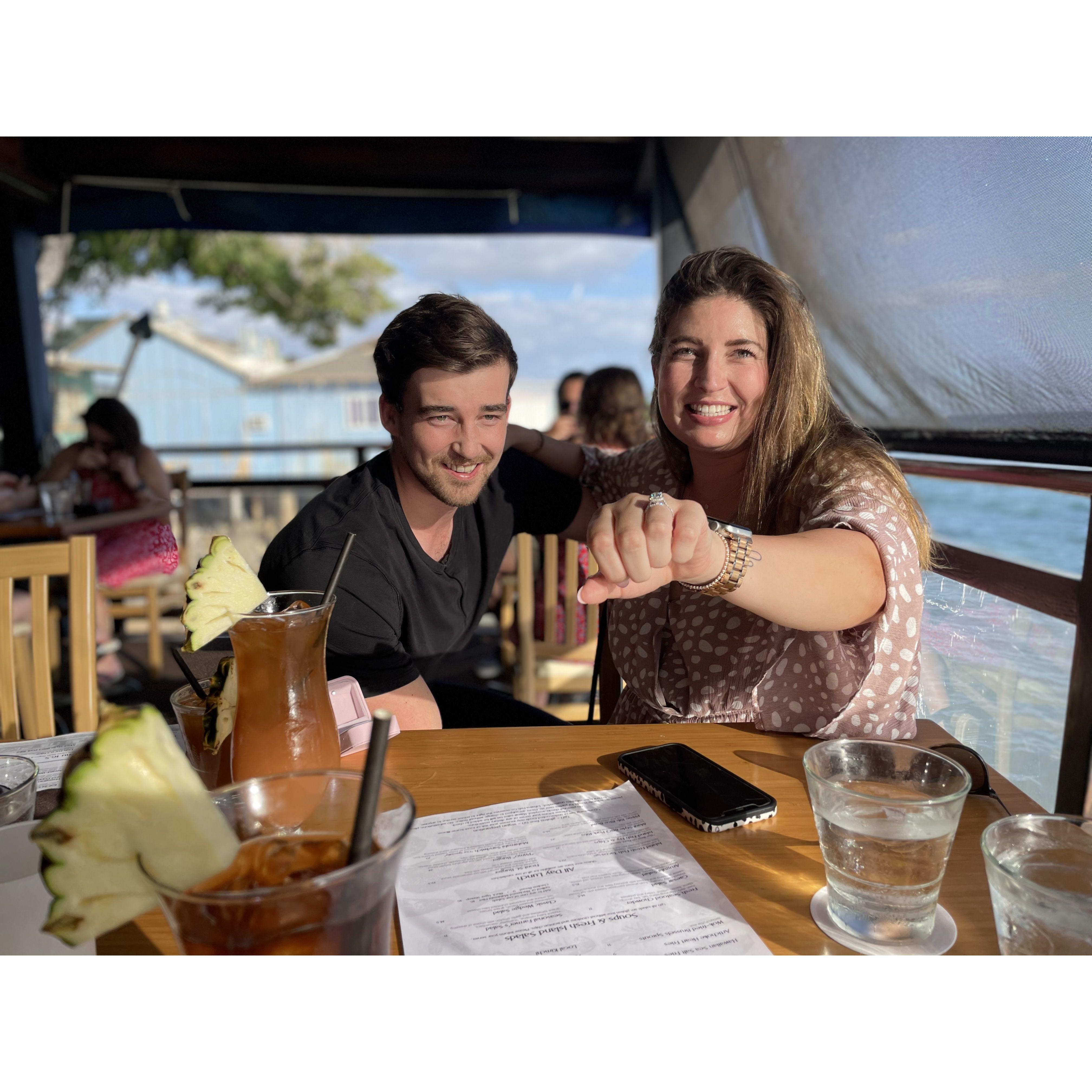 Tyler still down on one knee after his proposal in Hawaii!