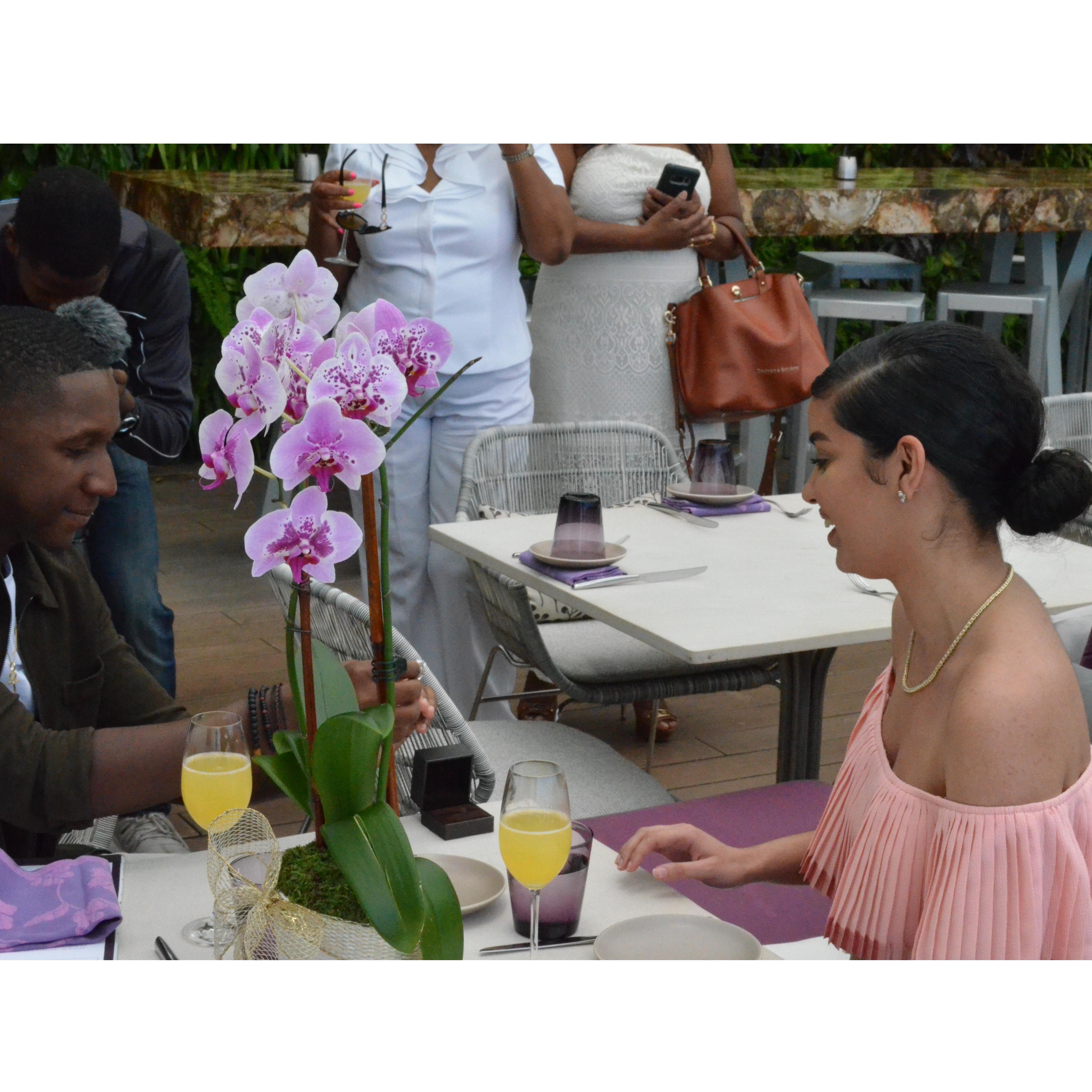 Overjoyed she said yes Joshua proceeds to place the ring on to Amanda's finger