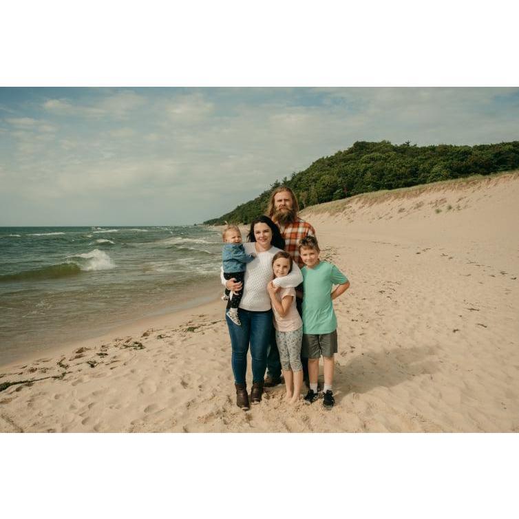 Our wonderful photographer took an opportunity to get in a quick family pic