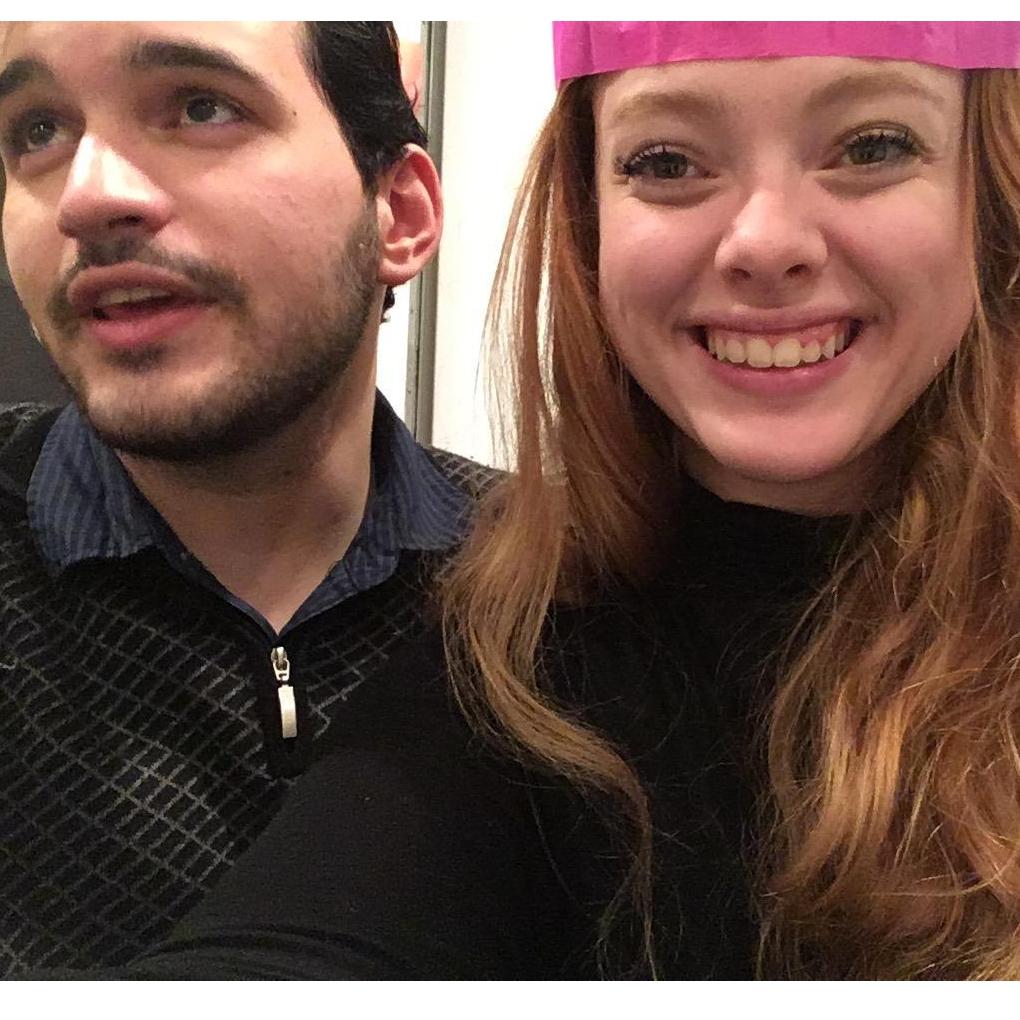 Our first Christmas together! Our musical Christmas popper playing was apparently not in tune enough for Billy, but don't let that fool you - we have a wonderful time.