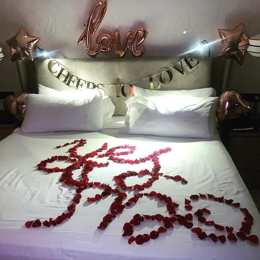 The night we got engaged, and the hotel staff decorated our room.