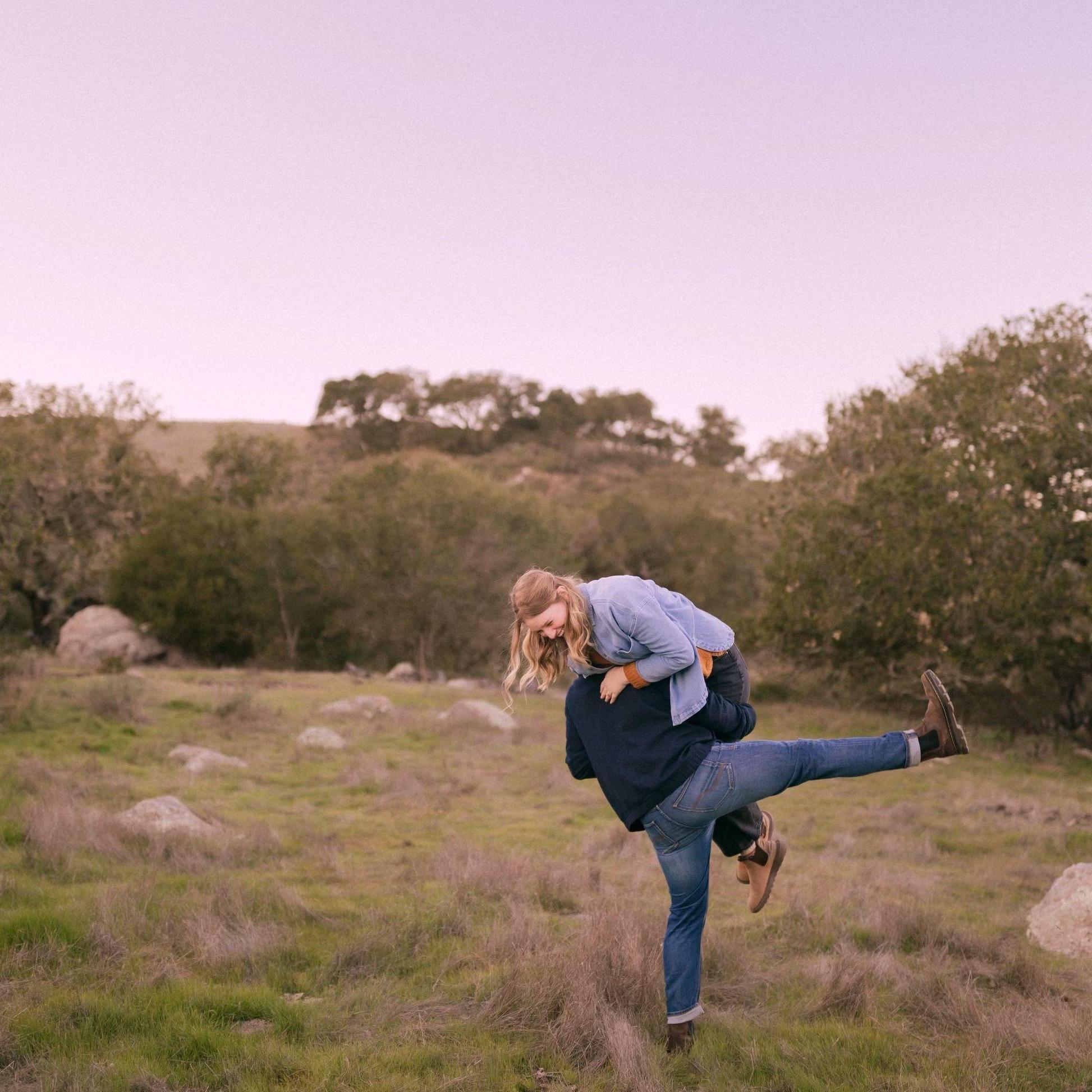Nick and Mads had their engagement photos taken at the base of Bishop peak in San Luis Obispo. It wouldn't be Nick & Mads without having some fun with it.