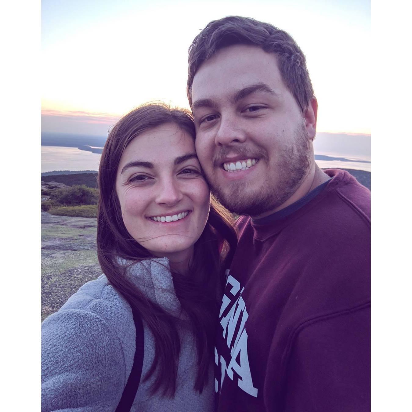 Watching the sunrise on Cadillac mountain in Acadia National Park, one of our favorites