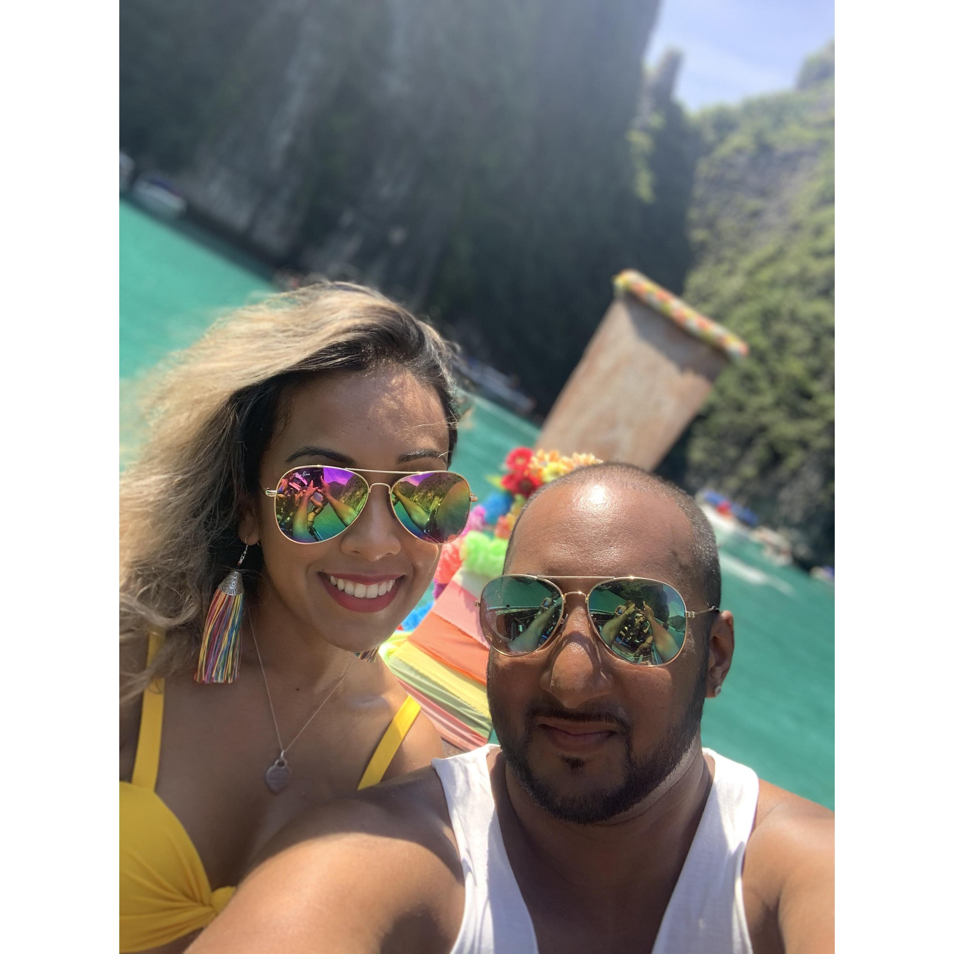 Cruising the pristine waters of Maya Bay in the iconic long tail boat.