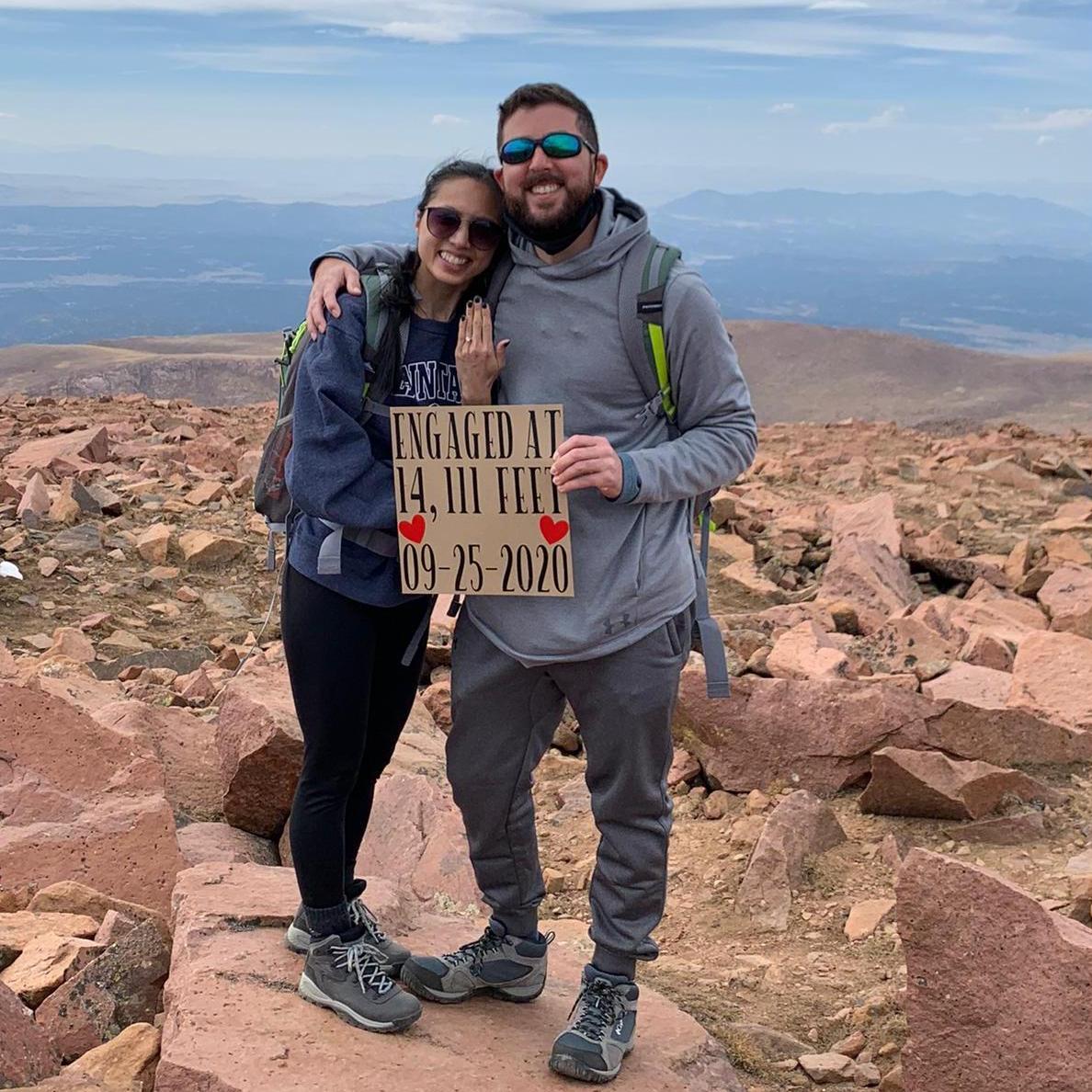 The best view. Feeling on top of the world. We're engaged! Cheers to our adventures to come.