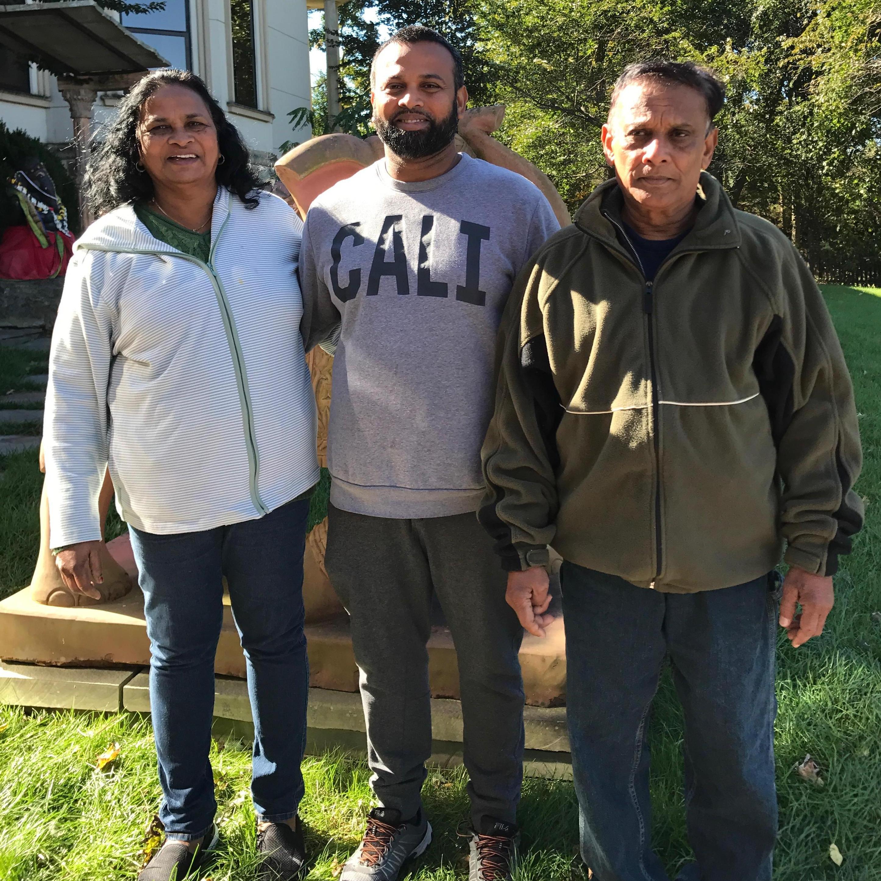 E- with his mom and dad!