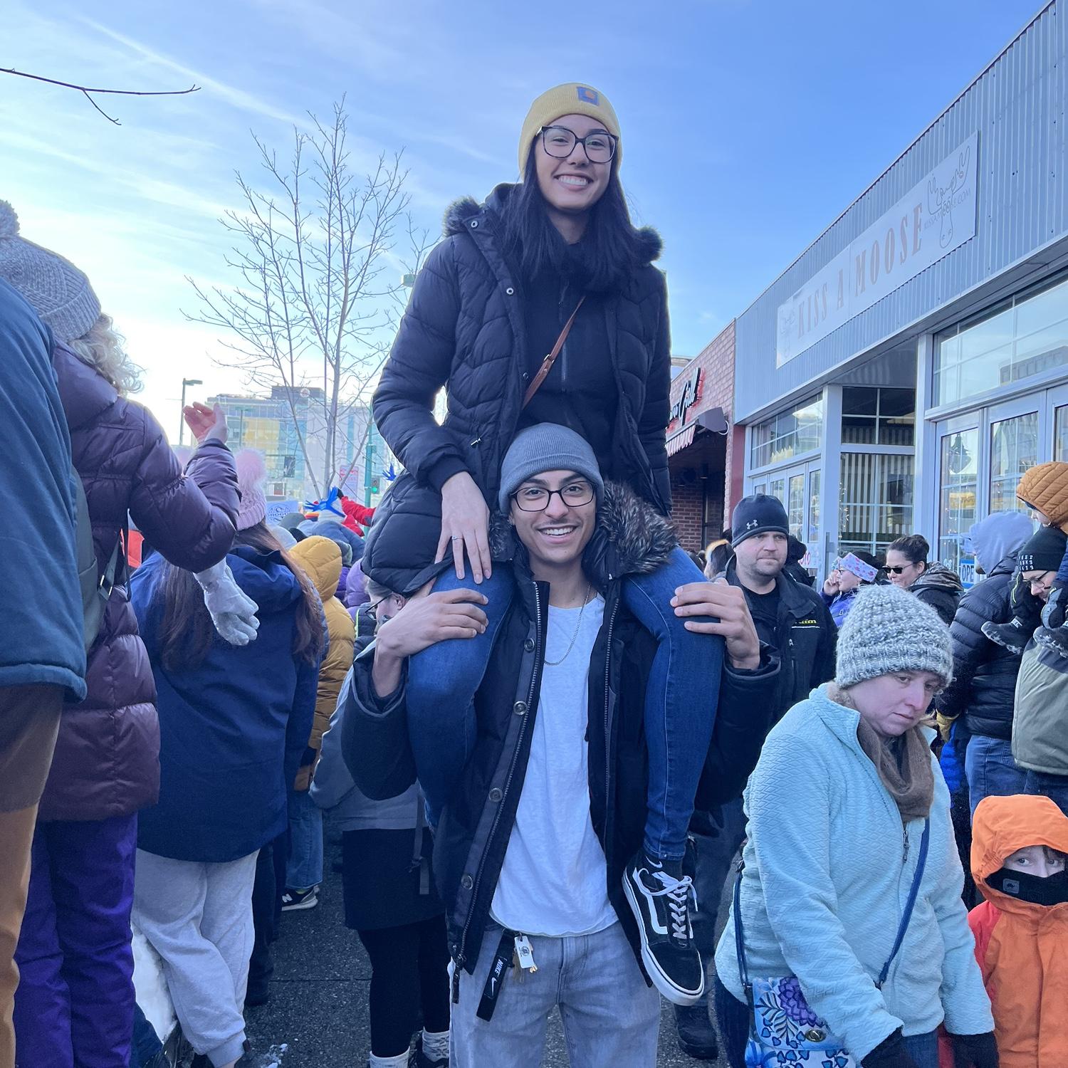 The birth of our signature pose. I couldn’t see at the Iditarod race so he put me on his shoulders. The view was so much better!