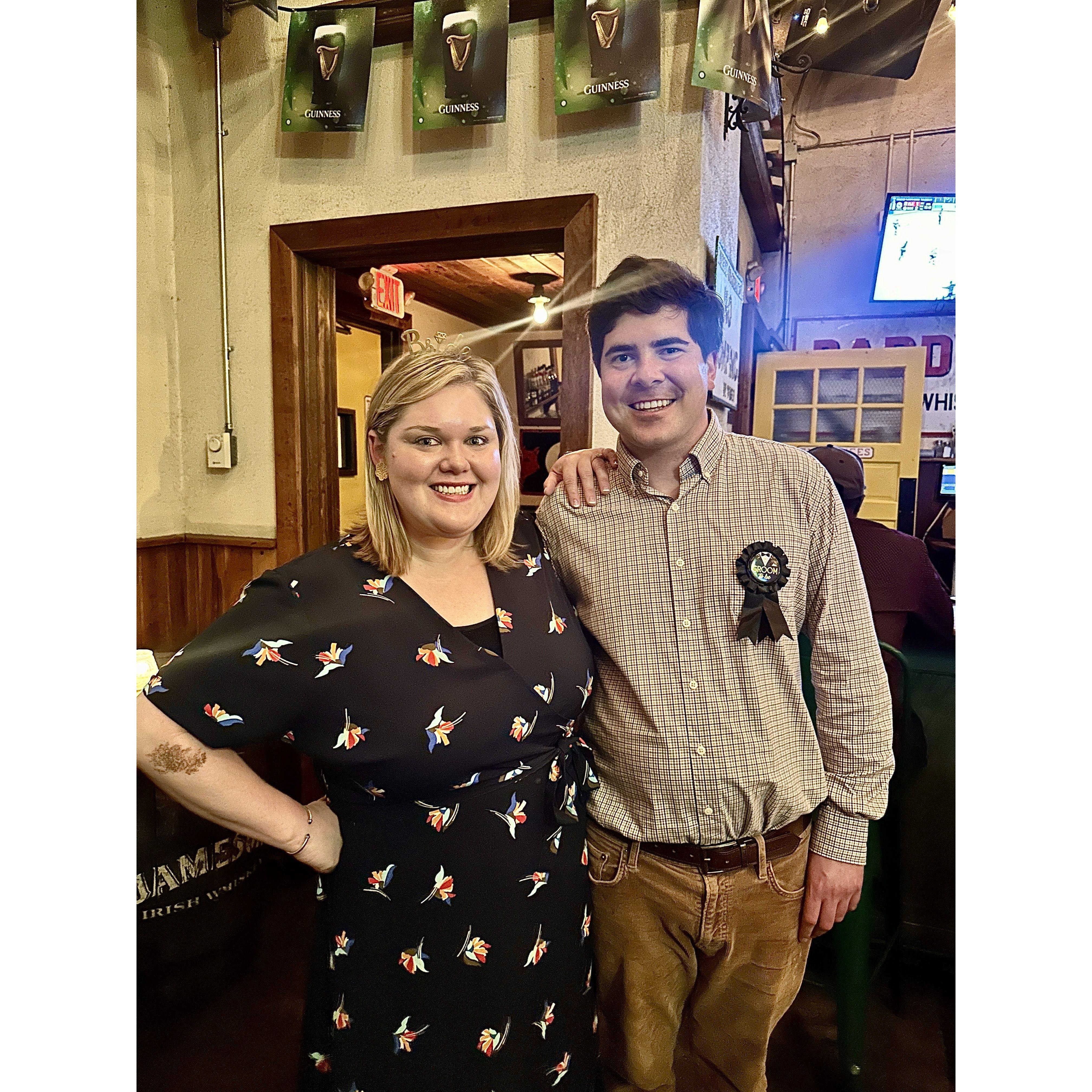 Celebrating the night of our engagement with friends at a surprise party at Workman's Friend