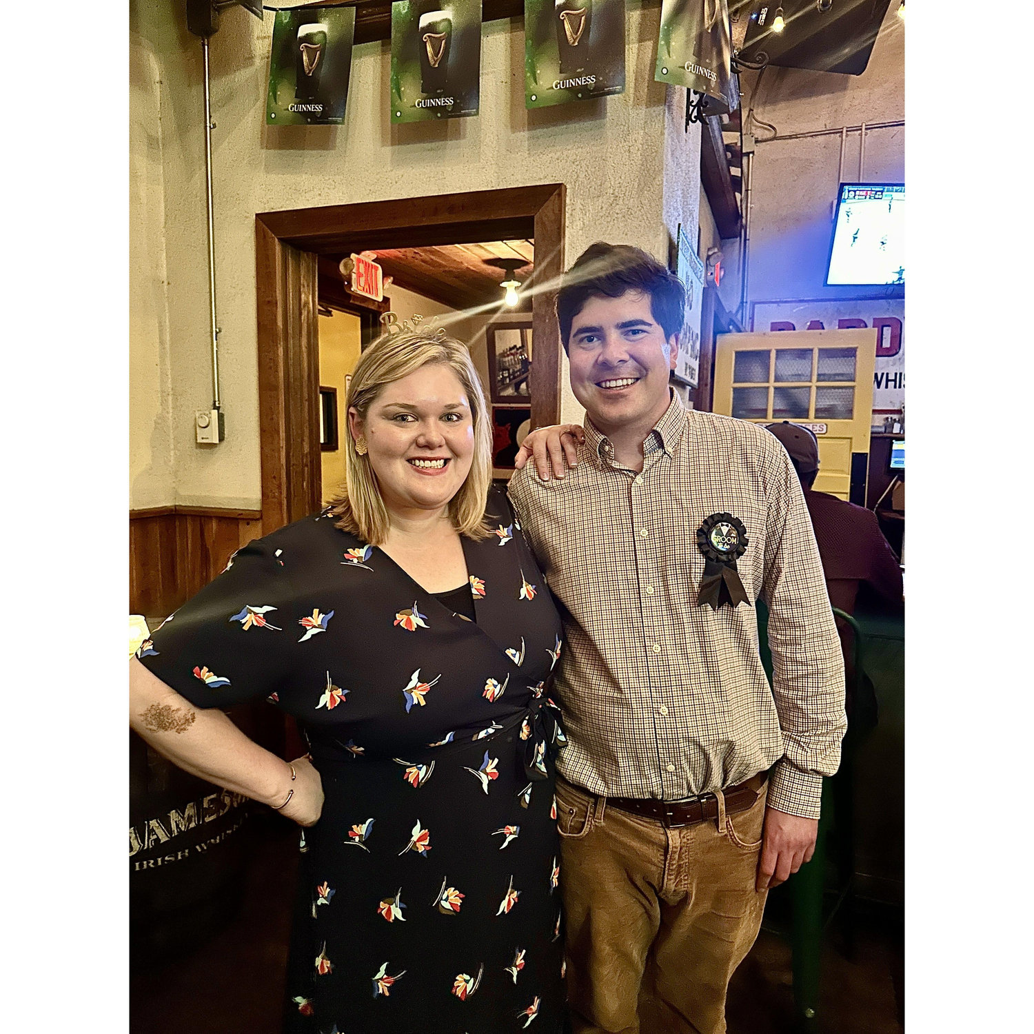 Celebrating the night of our engagement with friends at a surprise party at Workman's Friend