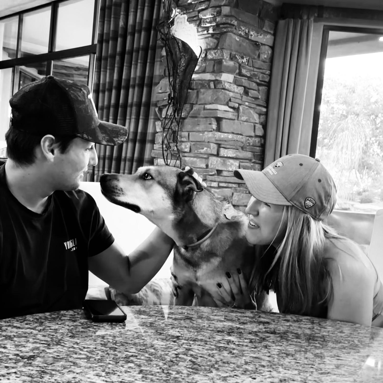 Us with our sweet rescue pup, Suki! She is our world