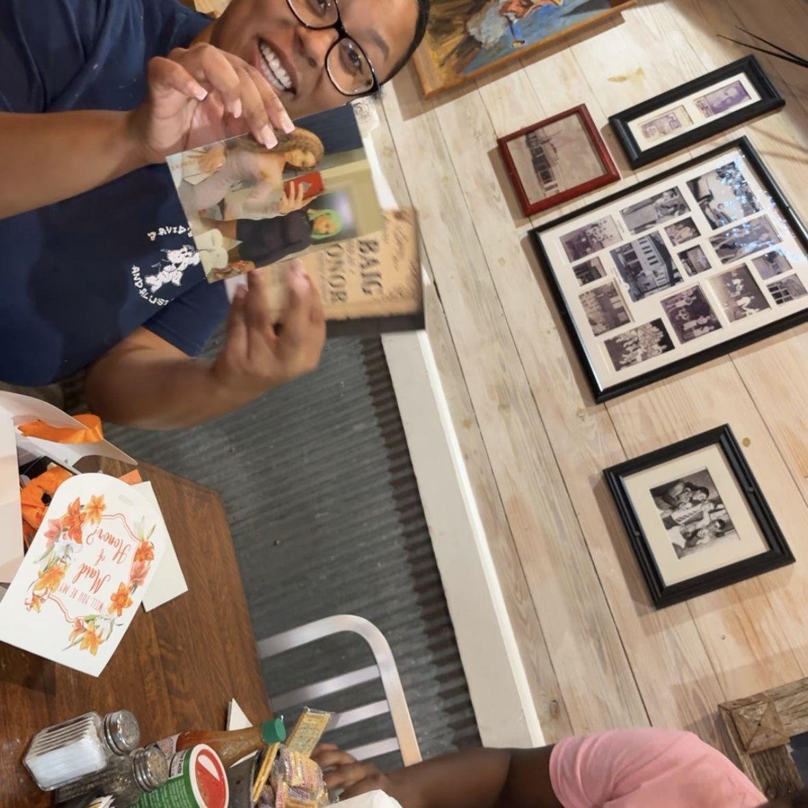 Bri and Jerrikah accepting their bridesmaids boxes!