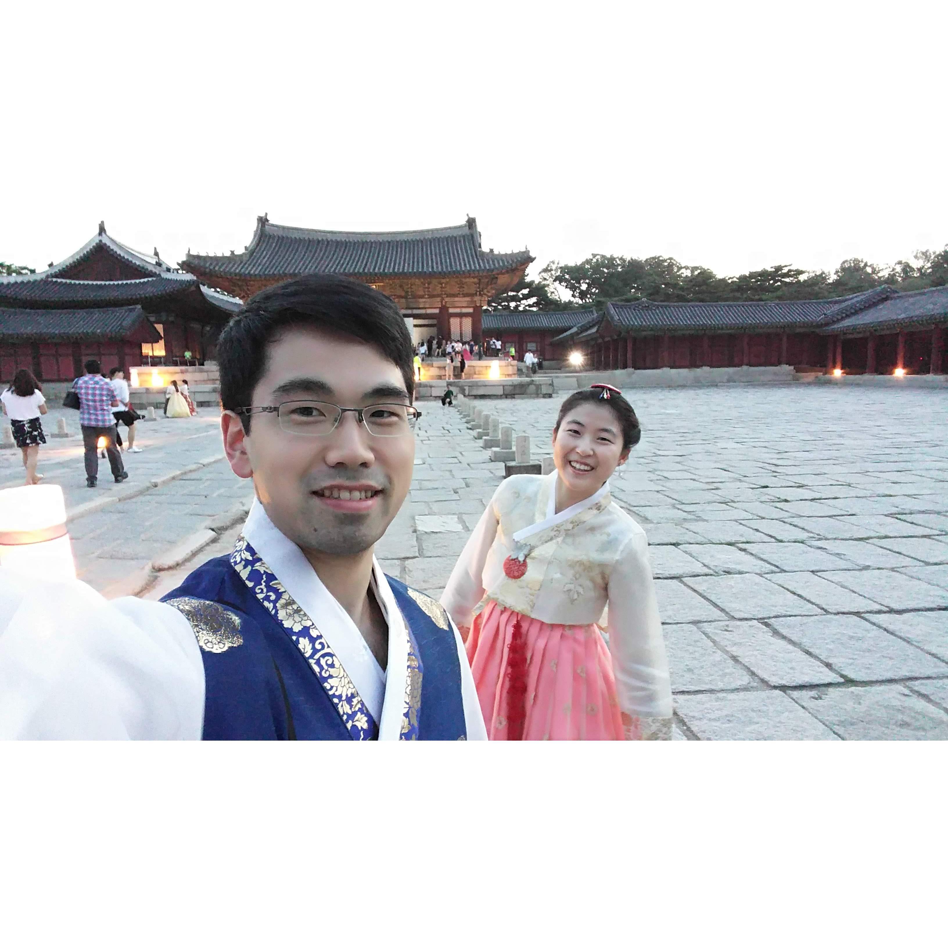 Gyeongbokgung Palace in Seoul. In Korean traditional clothes, Hanbok. June, 2017