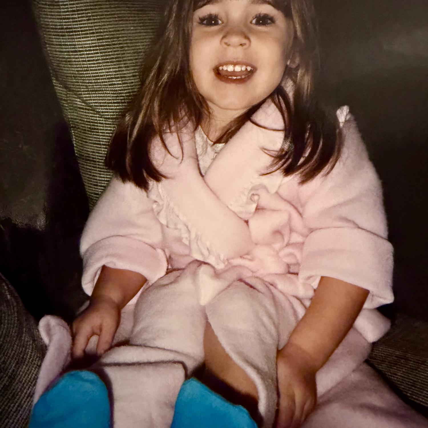 The pink robe is still very much a thing for Krystin as an adult.
