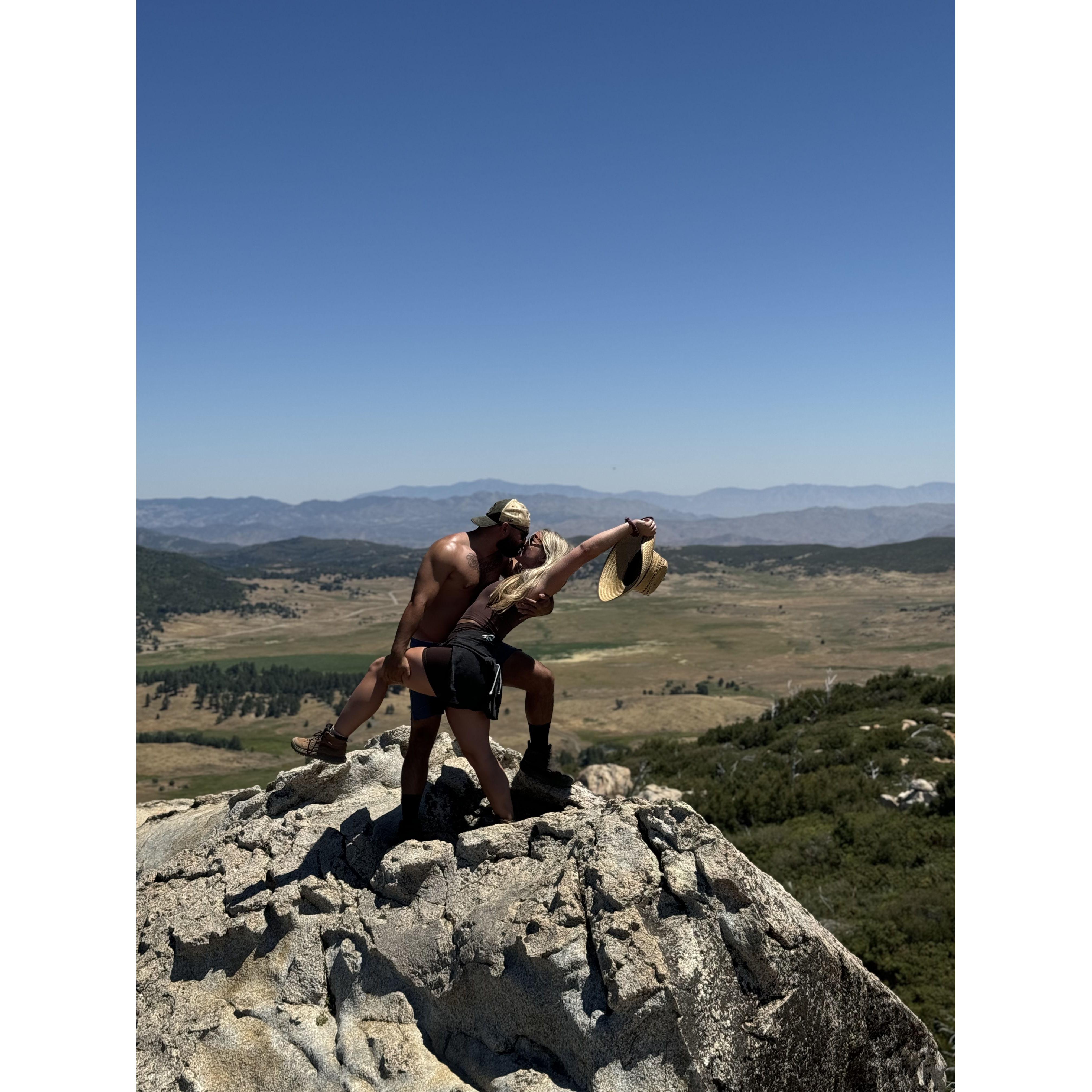 This was a weekend we went camping with a group of friends. We had so much fun! Then we all woke up an hiked this giant mountain and decided to kiss on it.