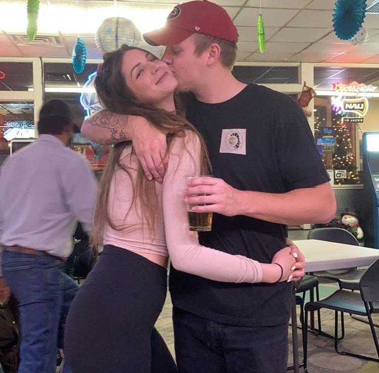 Our first ever photo together! Out with Allison's friends at Starlight Lanes in Flagstaff, 2020