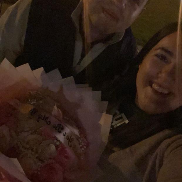 Our first photo together — taken right after we started dating.