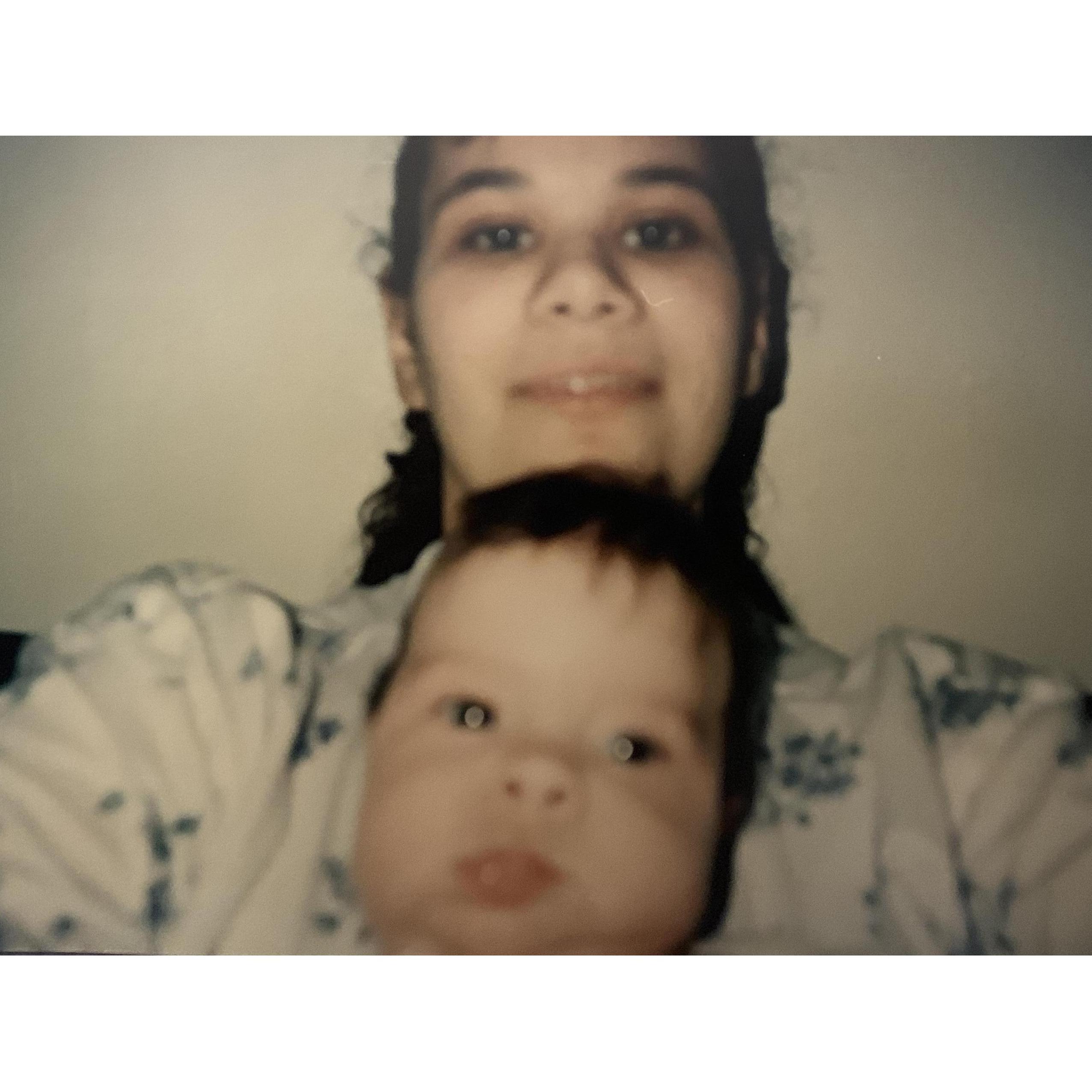 Alexis and her mom, Monica, taking a very early mother-daughter selfie (1995)