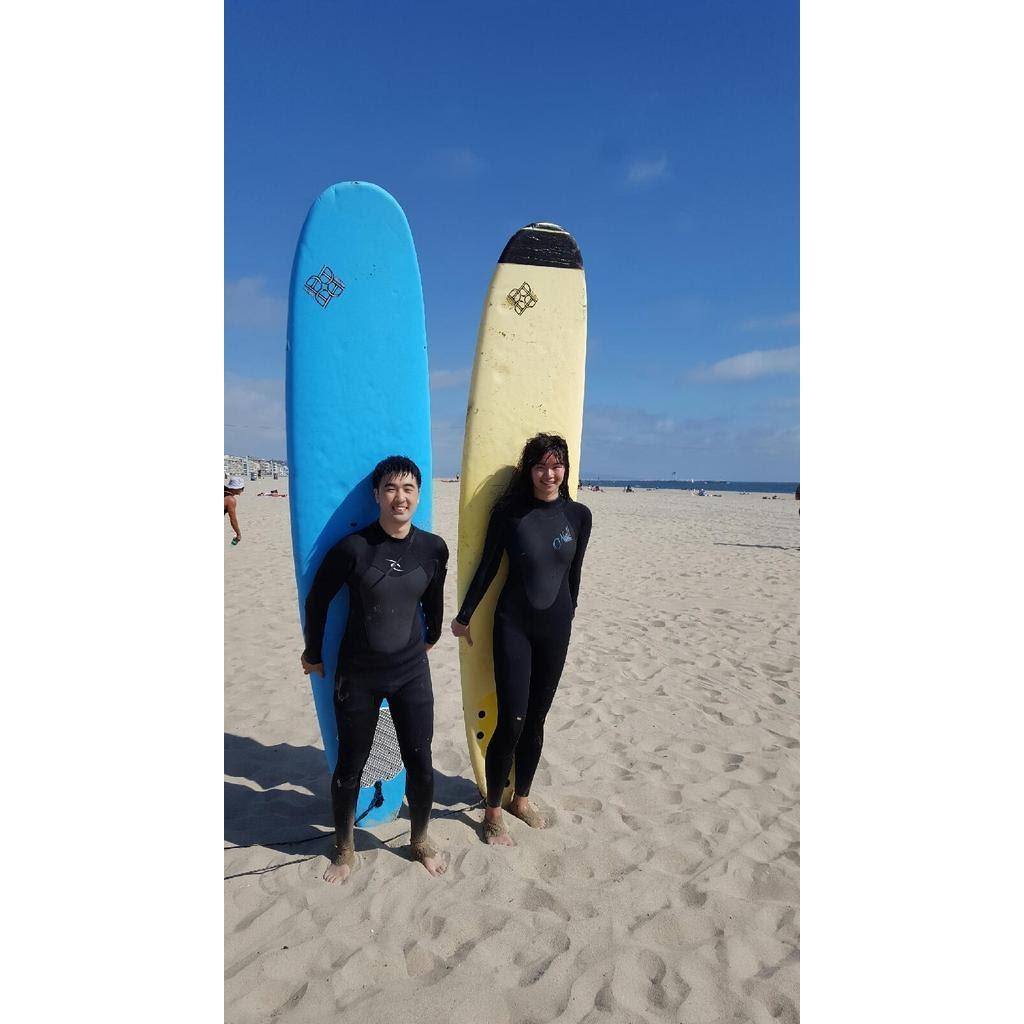 Surf's up! During our summer 2016 trip to LA, we took our first couple's surfing lesson together and snapped this cool pic.