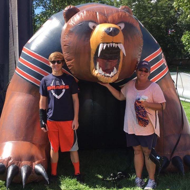 Kaleb and his mom supporting the Bears in 2016!