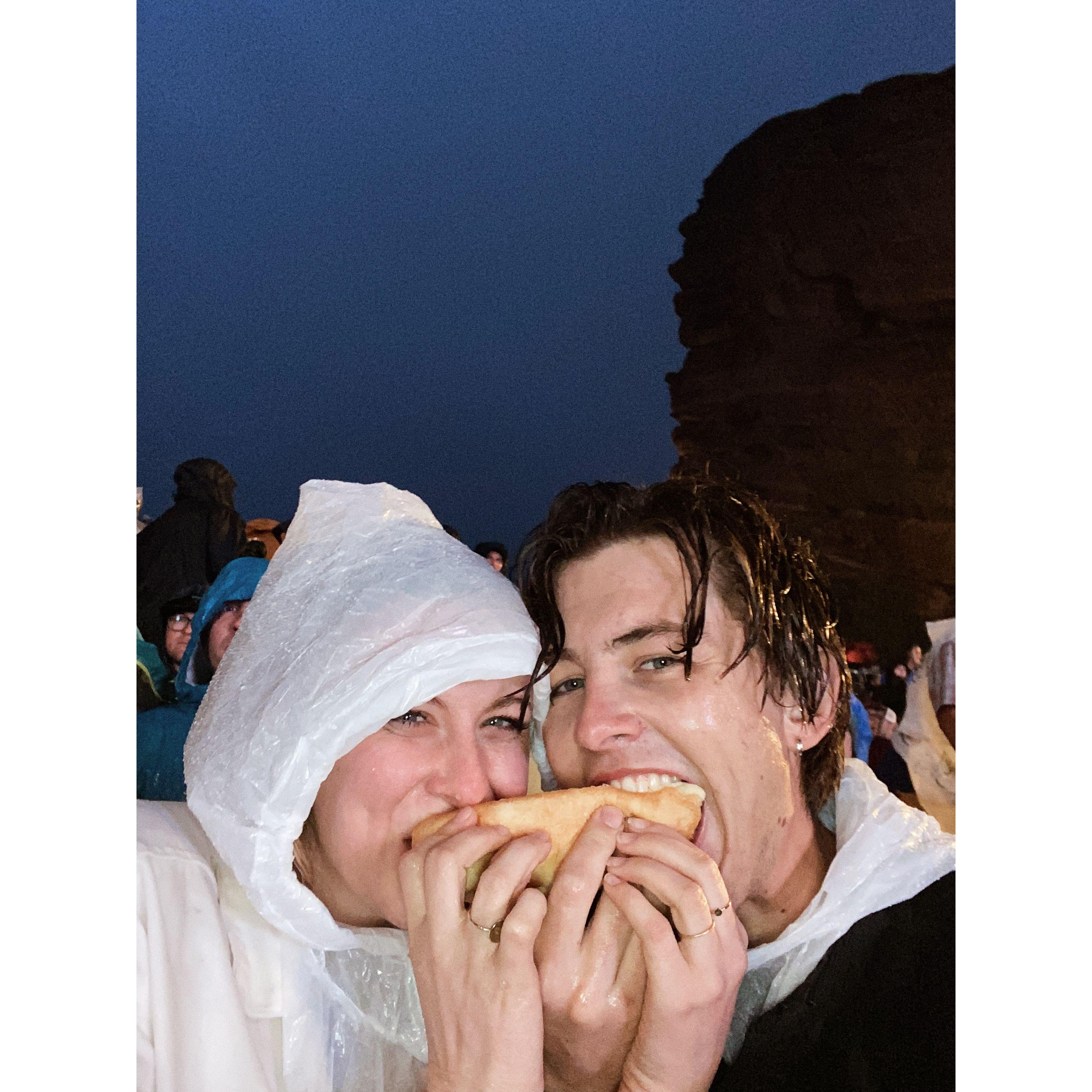 We went to see our favorite band, Caamp, at Red Rocks and got completely drenched by the rain and split a soggy hot dog. It was magical. Our first dance song will be On & On & On by Caamp!