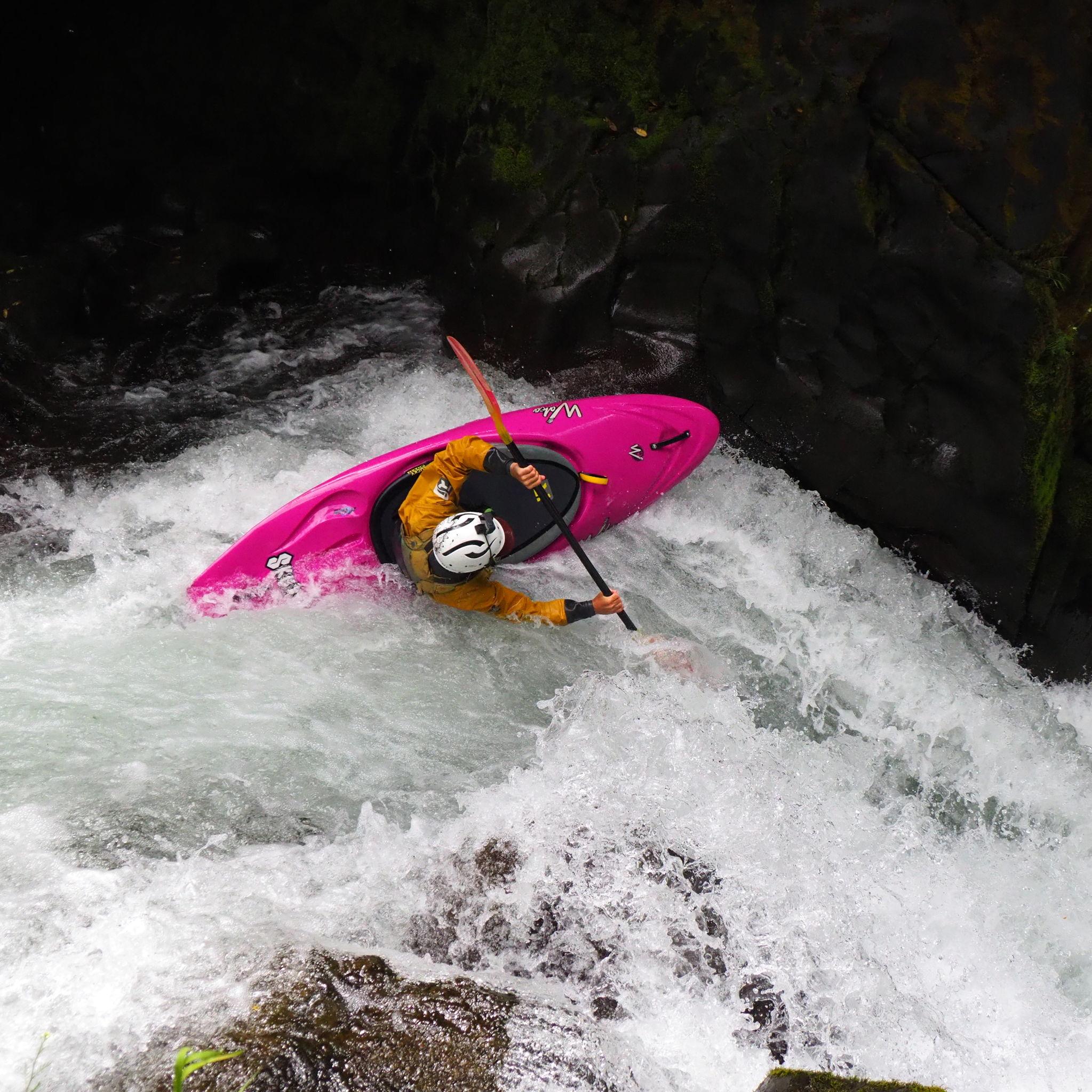 Kayaking together on the Rio Palguin in Chile--this is Owen!