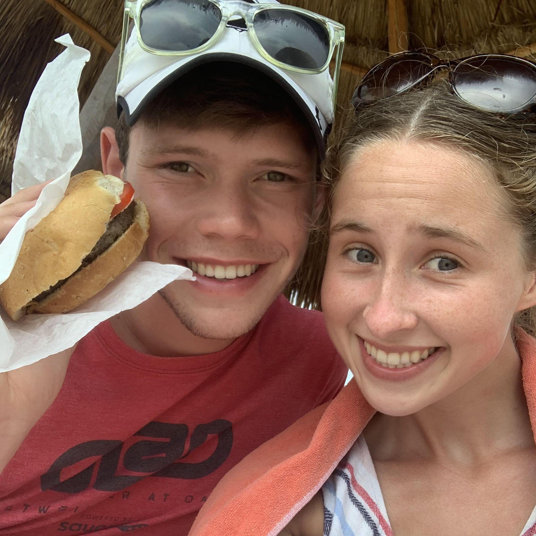 Enjoying lunch from the beach burger shack in Mexico for our college graduation gift!