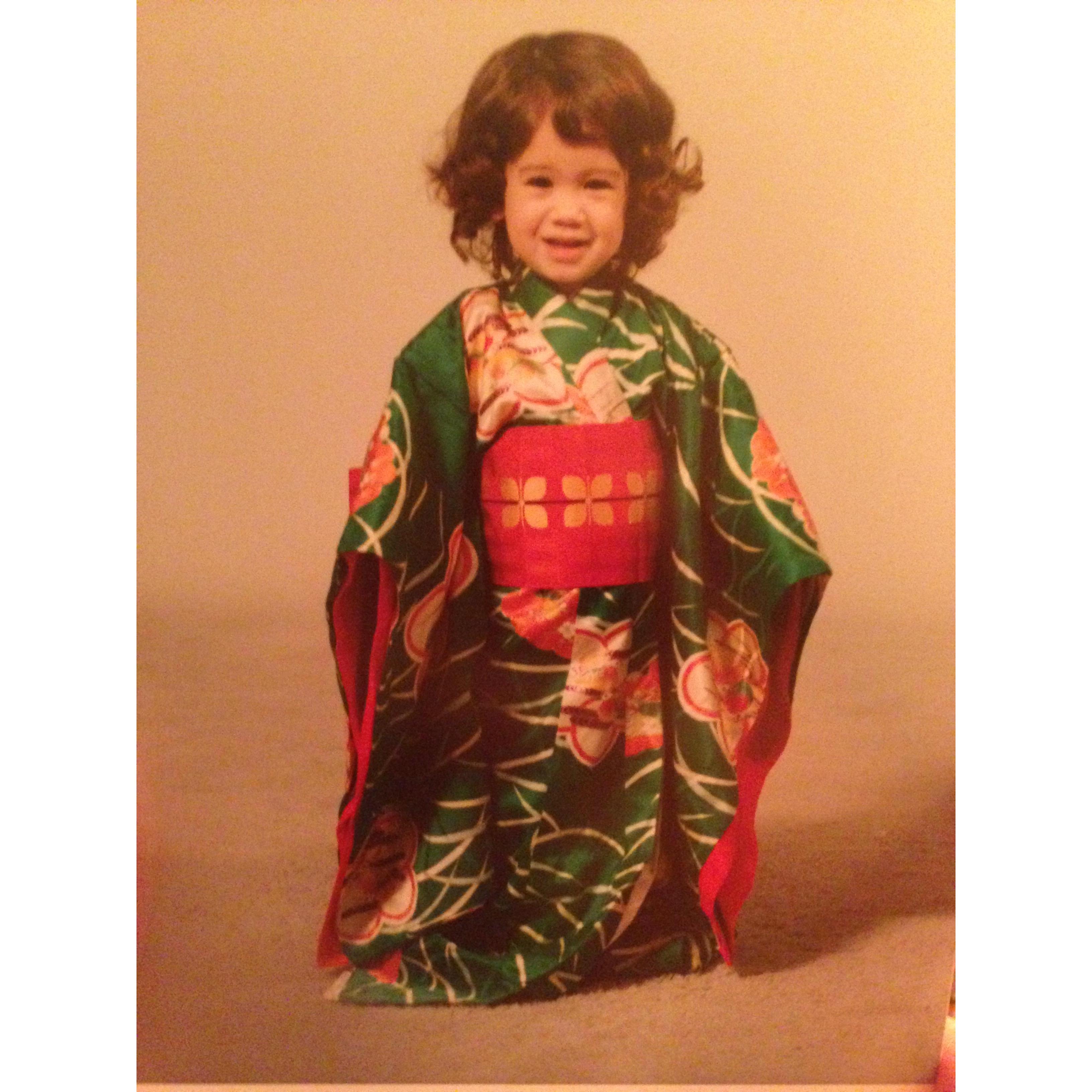 Little Wilma engulfed her kimono