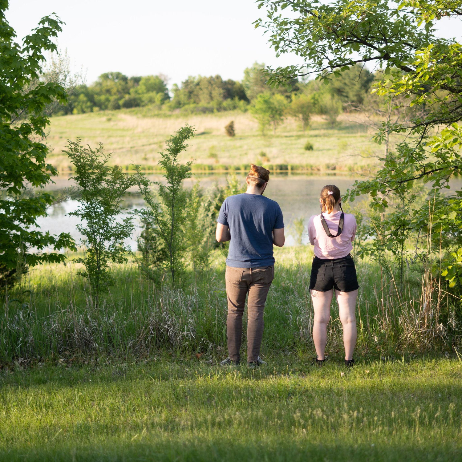 Anna and Marcel birding after Sophie's college graduation in 2023