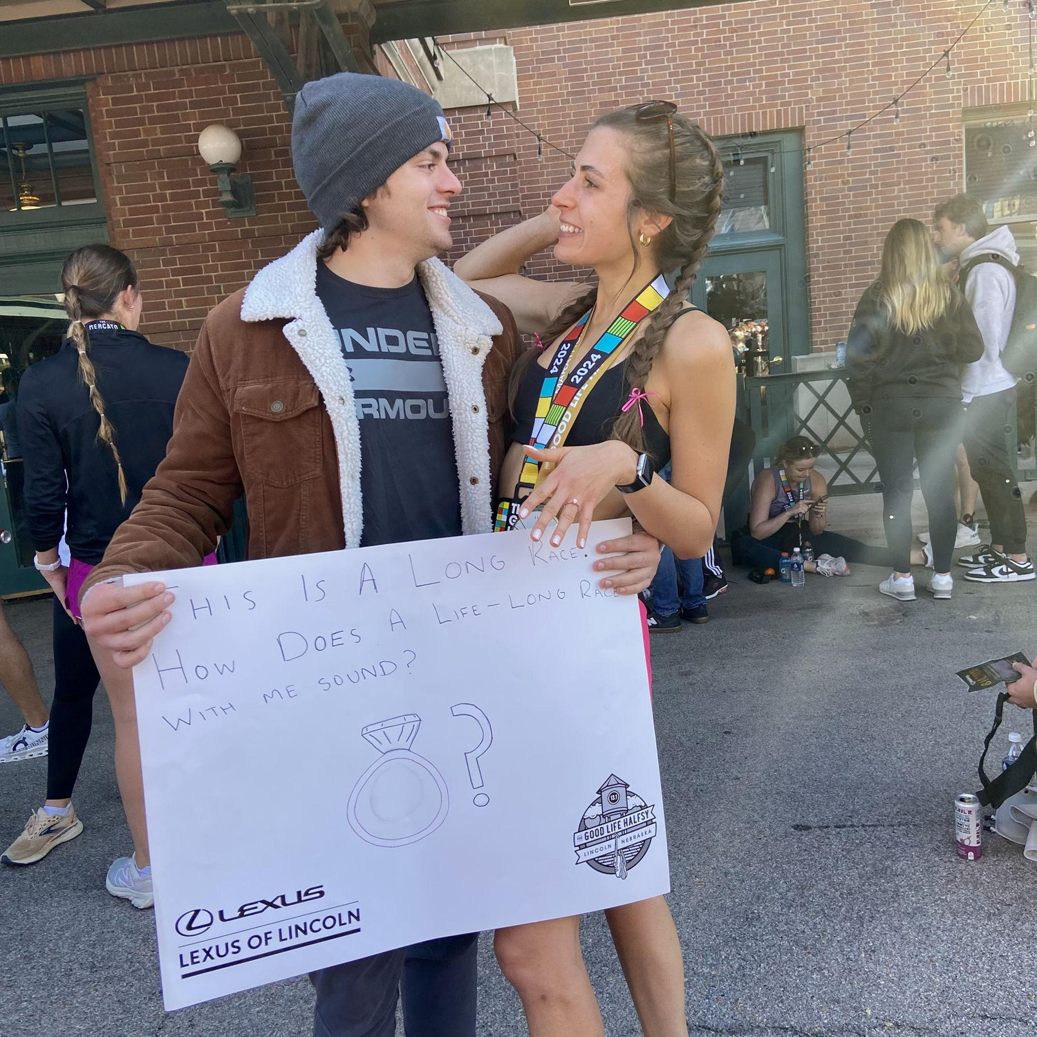 Our engagement! At the finish line of the Good Life Halfsy!
