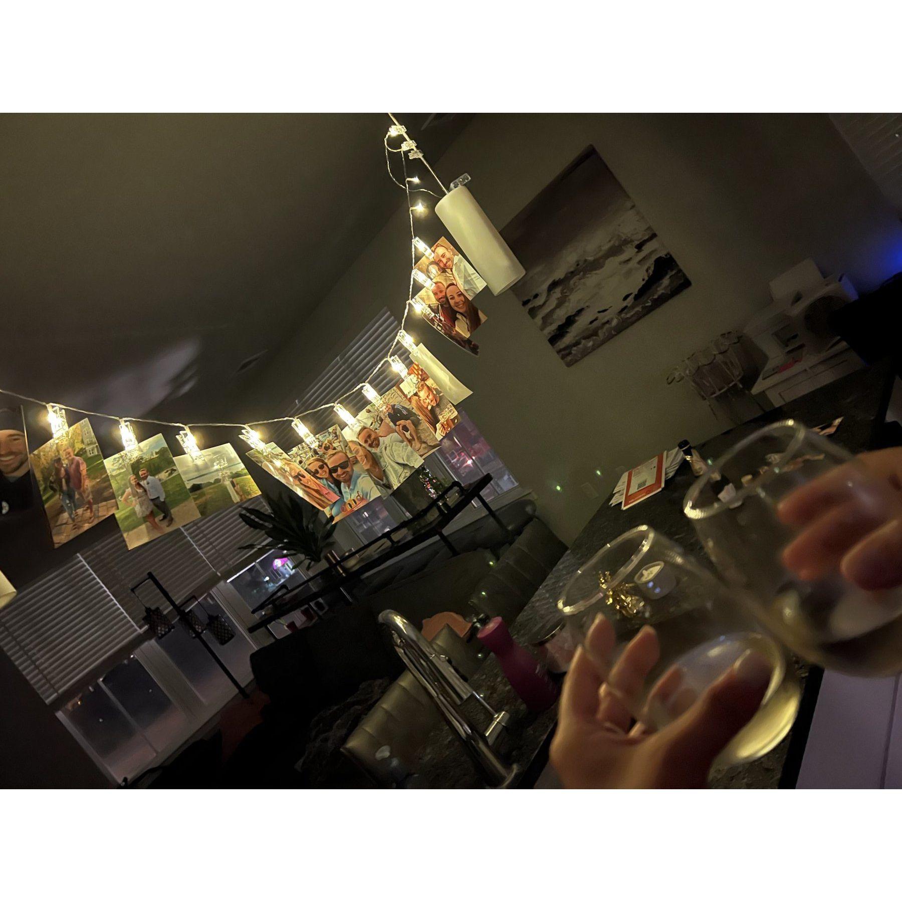 This picture was taken the night I (Leah) returned from a month traveling Europe (longest amount of time we've spent apart). Riley surprised me with pictures of us and champagne.