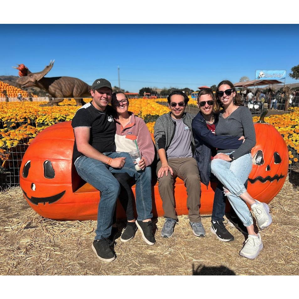 Taylor, Kelsey, Yohan, Bryce, and Caroline at a dinosaur-themed pumpkin patch in Gilroy.
