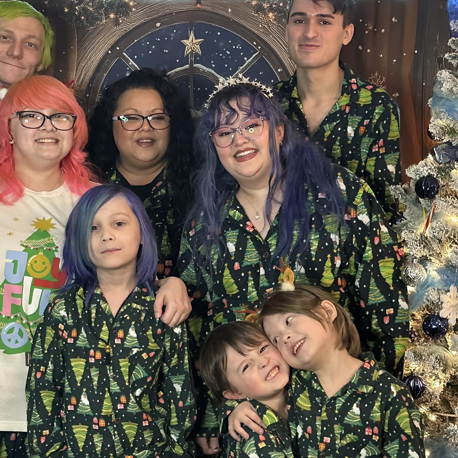 2024 our first Christmas family photo. WITH MATCHING PJS. A start of a beautiful tradition.