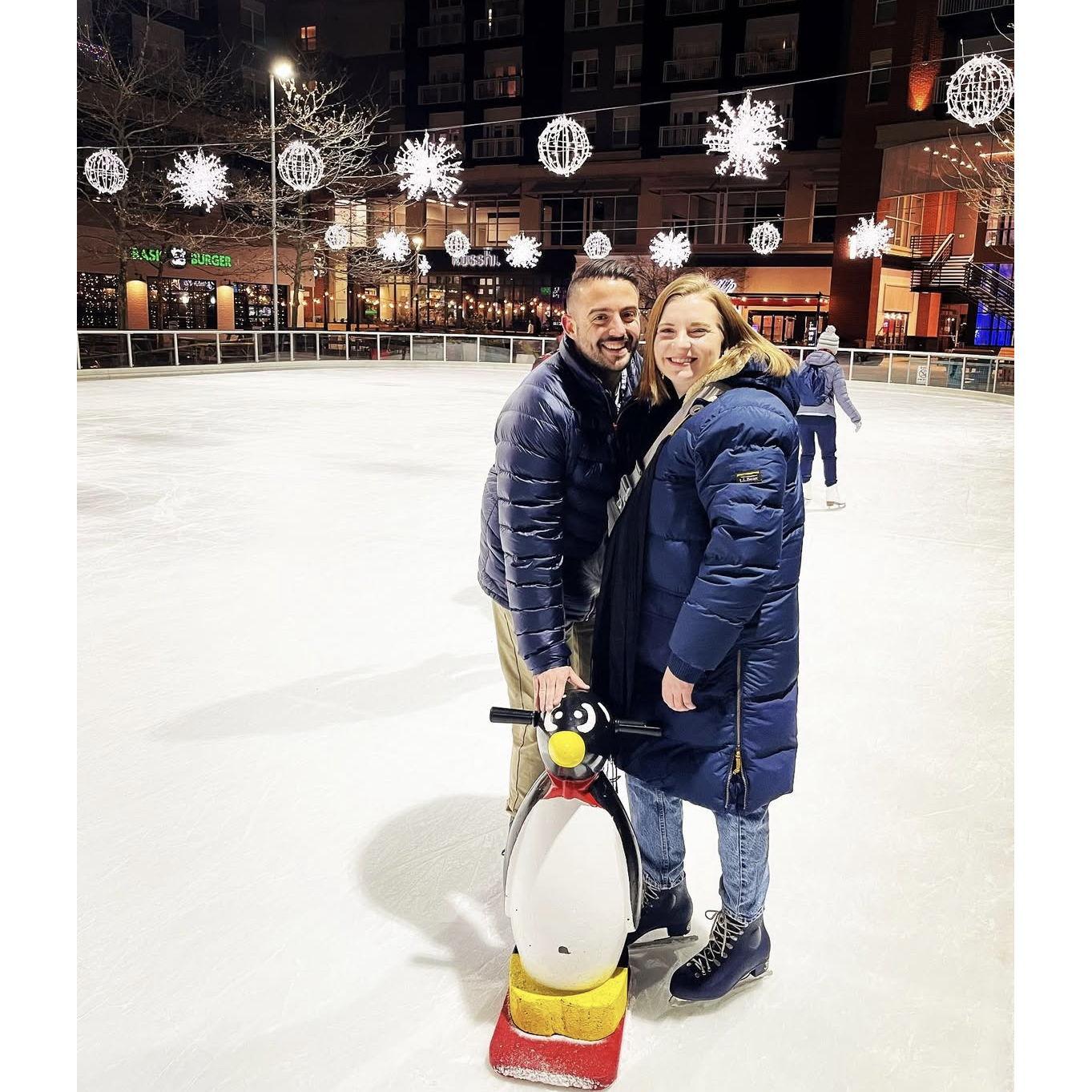 Zach holding Averie up skating!