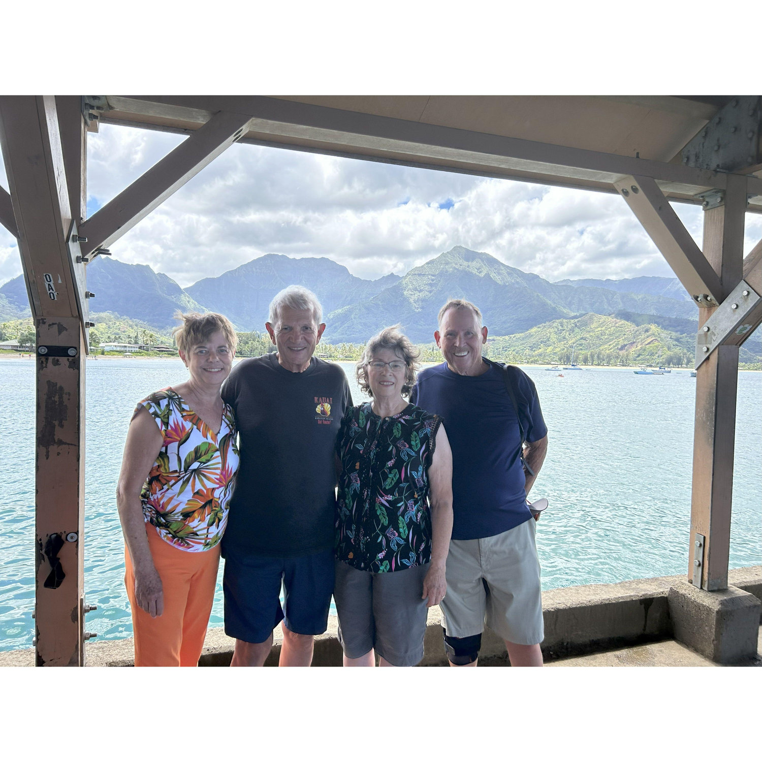 Hanalei Bay with Puff the Magic Dragon hills in the background. Barbara, Paul, Mary, and Norm--Sep, '24