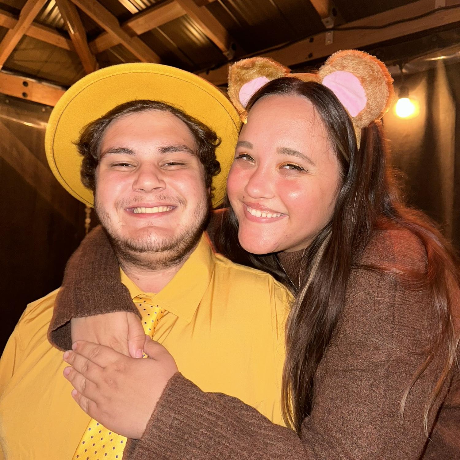 Caitlyn and Jaxon dressed up as Curious George and the man in the yellow hat for Halloween 2023!