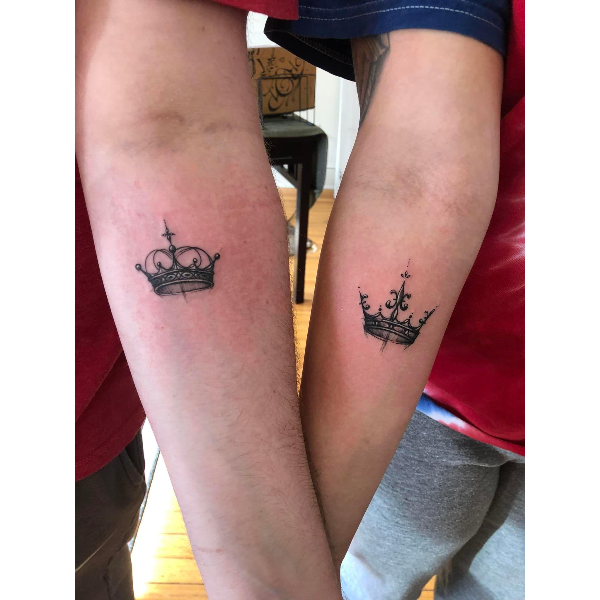 Our matching crown tattoos.