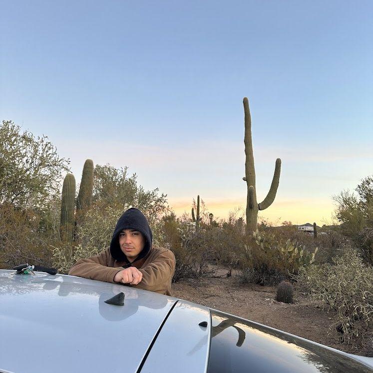 We woke up early to watch the sunrise together in Saguaro National Park